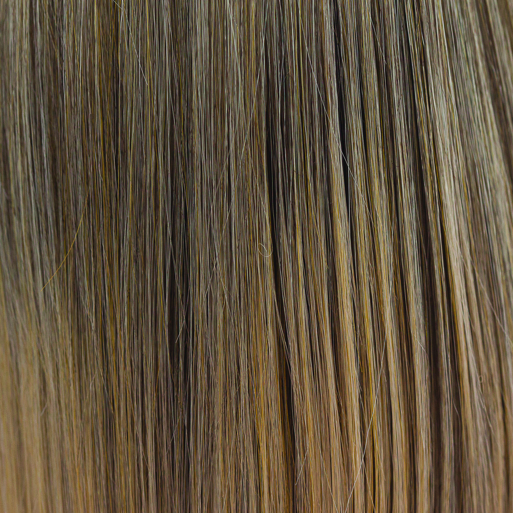 Buttered Toast  -  A medium blond smoky infusion of colors! Buttered Toast has a graduated blend of sandstone blonds and soft truffle weaves, with dark beige blond slices and buttery blended undertones. Buttered Toast  -  A medium blond smoky infusion of colors! Buttered Toast has a graduated blend of sandstone blonds and soft truffle weaves, with dark beige blond slices and buttery blended undertones.