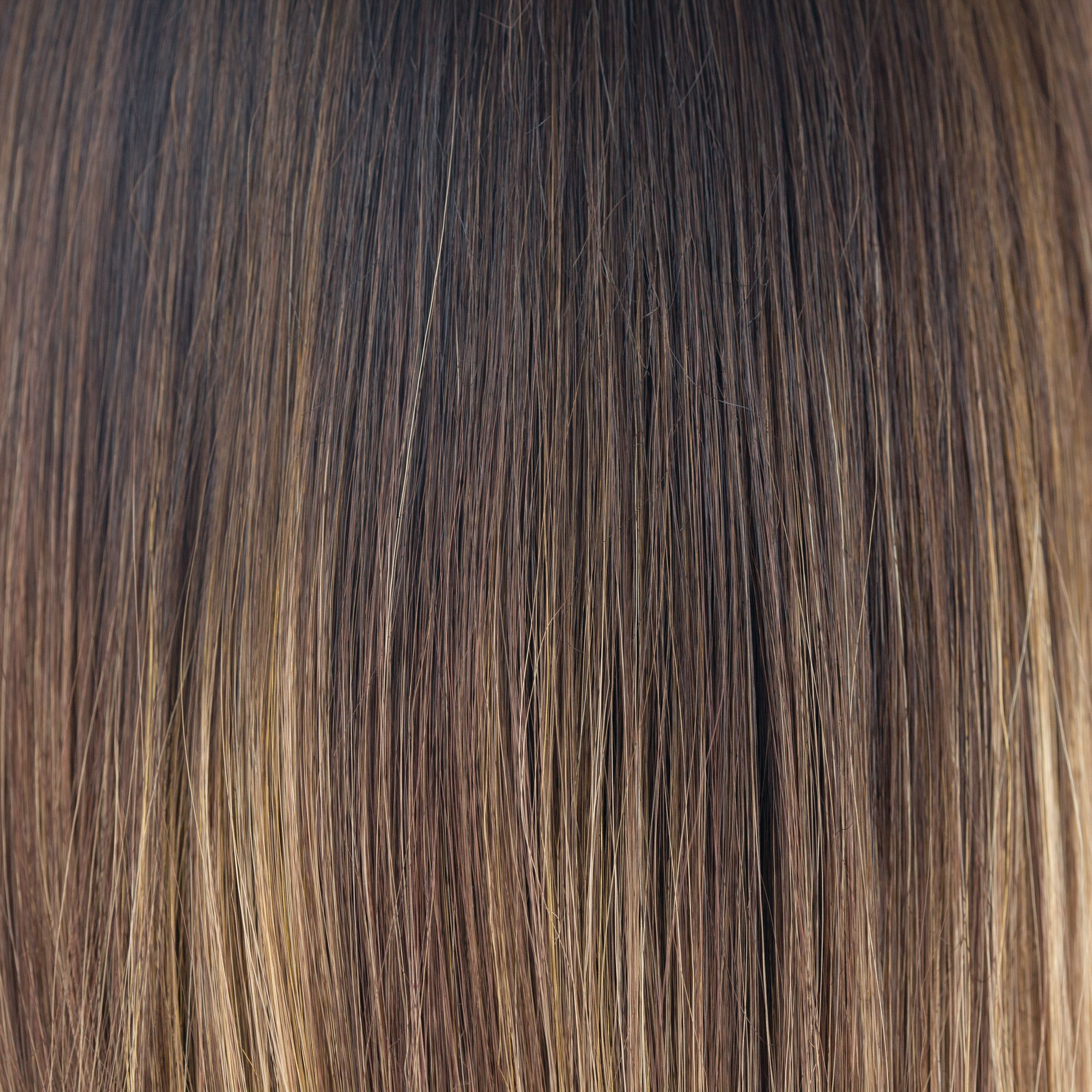 Marble Brown-LR  -  A long rooted beauty that combines the perfect mixture of warm dark brown and medium golden blond. Long, warm dark brown roots add a sophisticated finish. Marble Brown-LR  -  A long rooted beauty that combines the perfect mixture of warm dark brown and medium golden blond. Long, warm dark brown roots add a sophisticated finish.