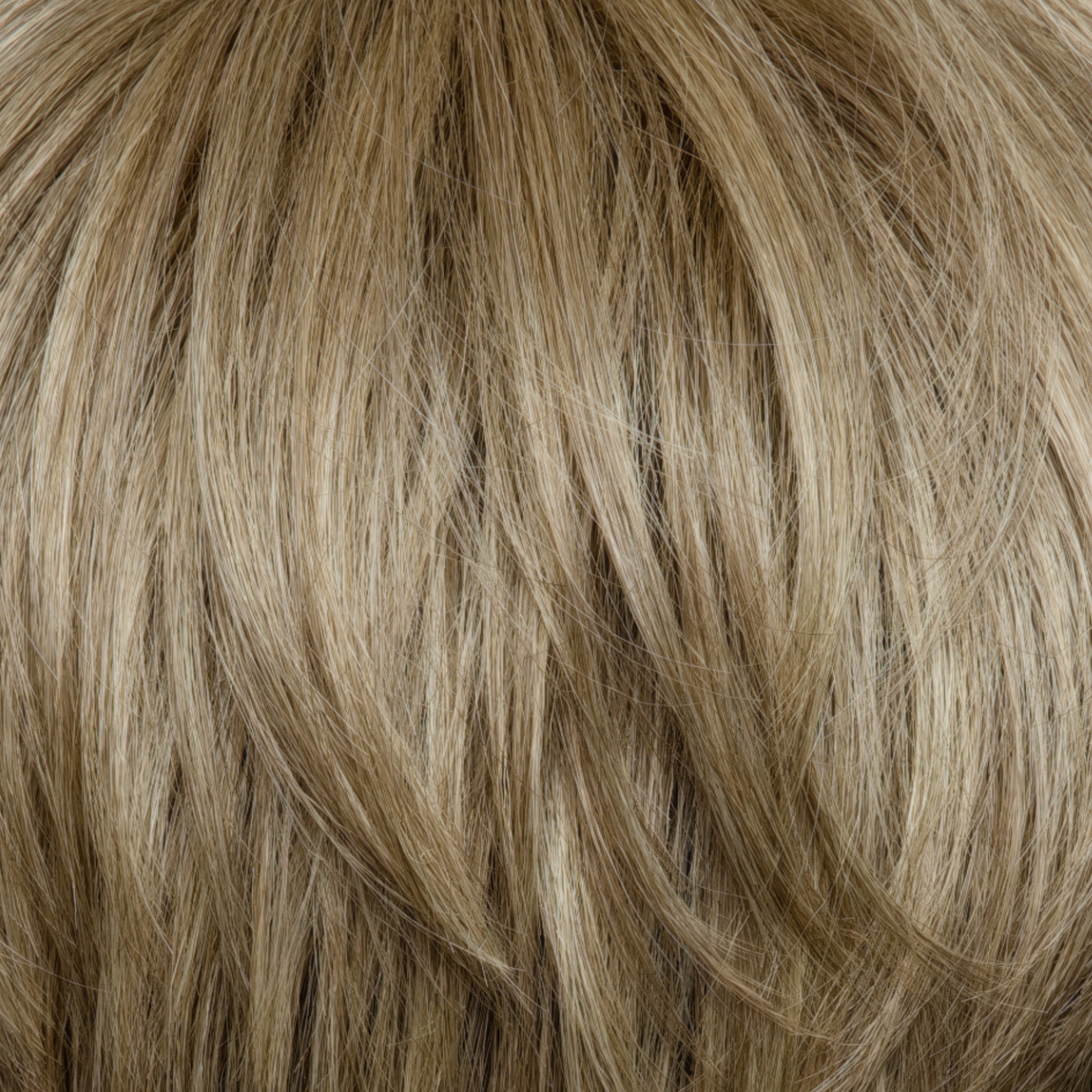Buttercream Blond  -  A stunning baby blond shade that exudes elegance and sophistication.  The harmonious blend of light ash, medium honey, and pale gold hues creates a luxurious and radiant finish, giving this shade a touch of class and the perfect balance of blond tones.