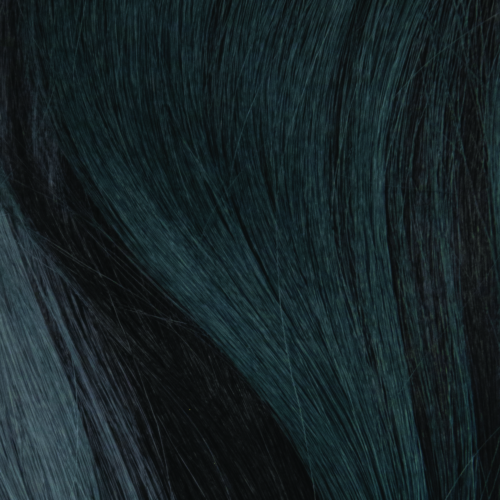 Cosmic Teal  -  A smoky fused deep teal base with off-black lowlights throughout. Nocturnal vibe with a cool, sophisticated attitude.