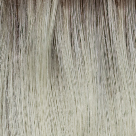 Creamy Dolce  -  A beautiful blond with a natural regrowth of a dark to medium honey brown with a whole host of tiny weaves of orchid white blonds and pale creams.
