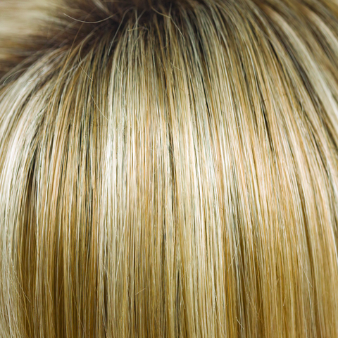 This is the rooted version of Creamy Toffee. The color has undertones of coffee, gold honey tones and cream blond with a toffee twist gives the root a very natural regrowth charming and sophisticated.
