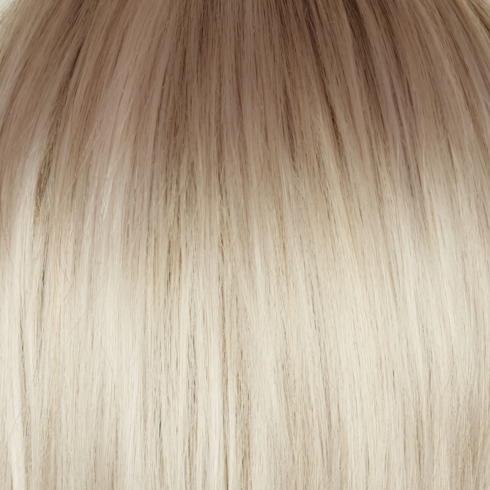 A rooted sister of the stunning hair color  ‘Ghost Blond’. This color has a medium neutral blond root regrowth which transfers into a pearl cream blond.