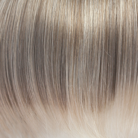 This captivating clever color has a blend of beautiful ash blond highlights and velvet blonds. Towards the ends of the hair you are hit with blocks of ice blonde tips. This Ice Blond color combination is great in any style. It is crisp and cool… we love it!