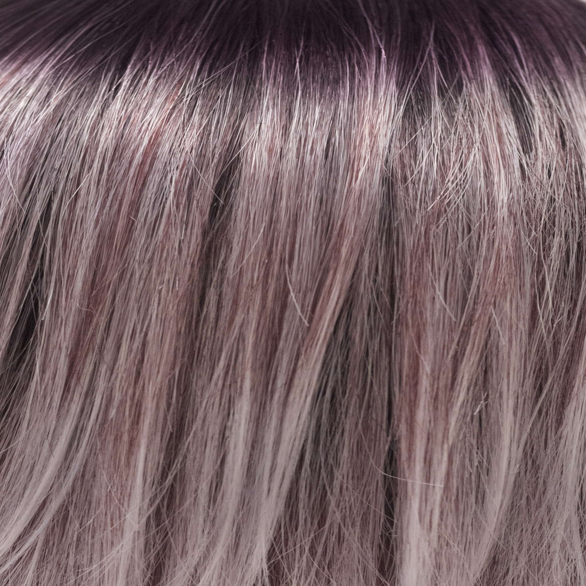 Melted Plum  -  A very intelligent color! It has dark amethyst stretch roots that blend into medium vibrant violets and finish to pale lavender blond ends. This suits all……. super, vivid and chic!