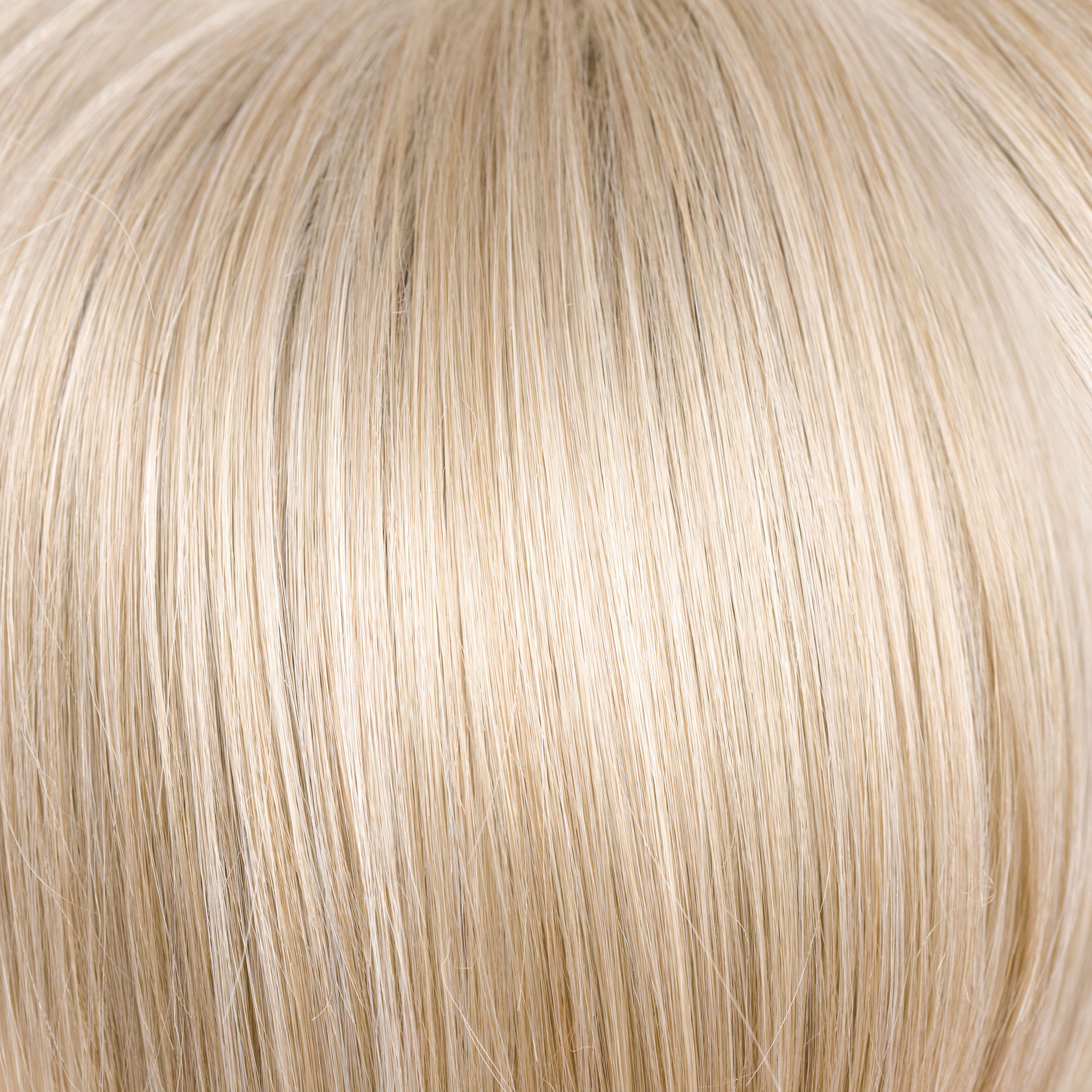 NM Creamy Blond  -  This bombshell blond is packed with platinum blond and creamy highlights. The lightest of our traditional blonds. Though it is very light, it is still able to flatter the skin tone with its unique blended formula.