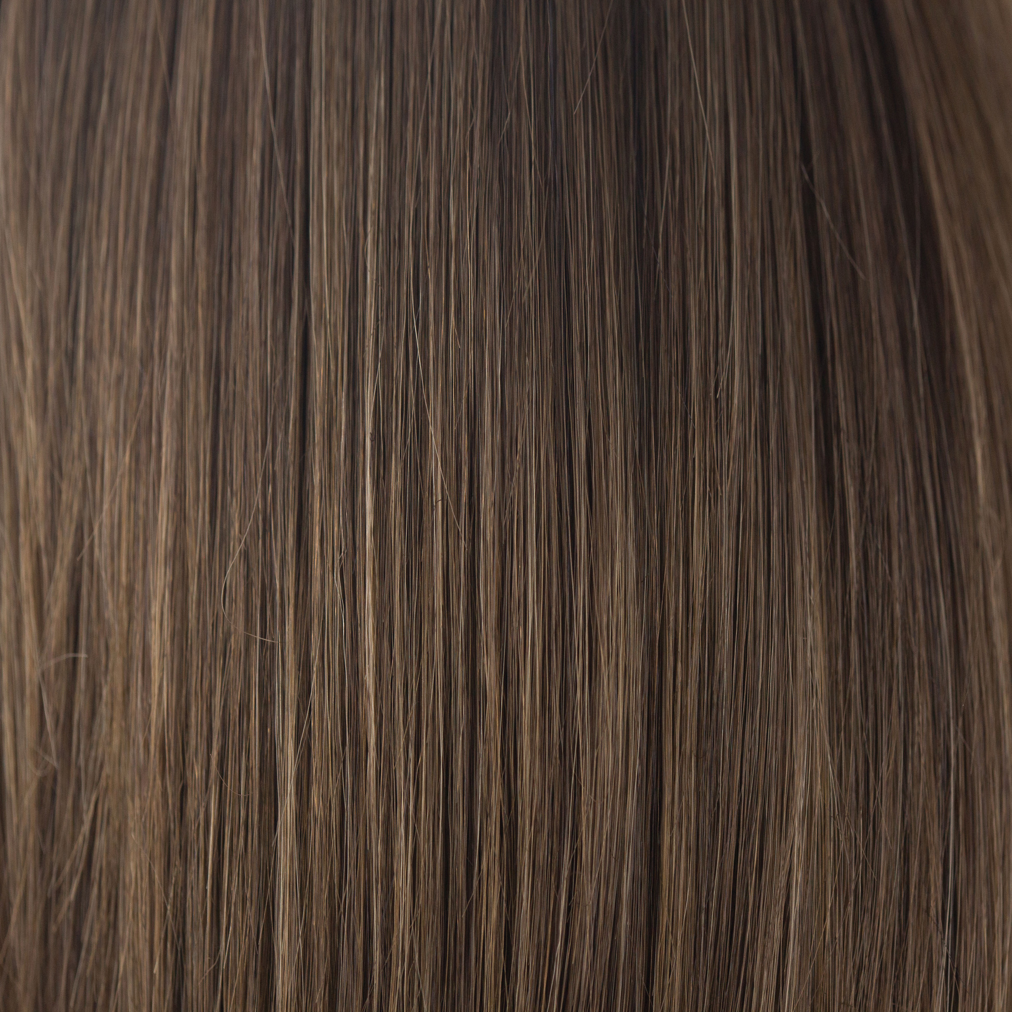 NM Medium Brown  -  This cool-toned medium brown is a perfect fusion for both brown and blond enthusiasts. Medium Brown is a beautiful blend of both worlds - an ageless classic.