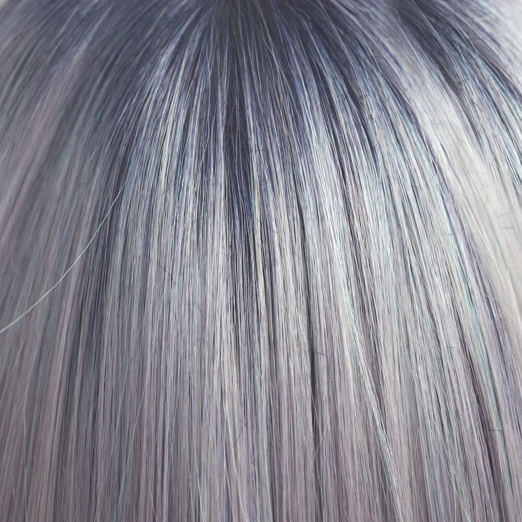 Pastel Blue-R  -  A cool pale pastel blue with hues of white. This Pastel Blue-R color has the palest of mineral blue highlights and silver shadows graduating from a dark blue sapphire root giving depth and definition.