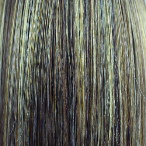 Peaches & Cream  -  A warm peach blonde base with creamy blonde undertone highlights. Highlights in a bright cream white blonde enhance the look, while a rich chocolate root regrowth adds depth and contrast.