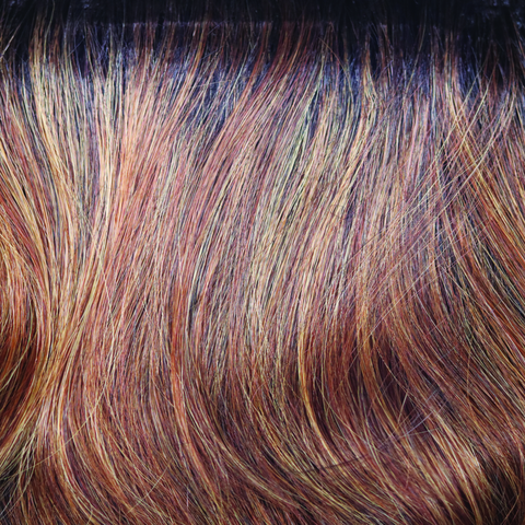 A dark amber brown root regrowth and adorable toned slices of copper blond and paprika. 