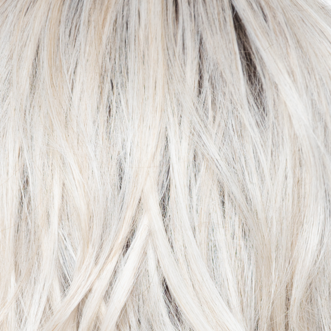 White Rose Blond-R  -  A white blond base with subtle warm brown highlights. The medium-brown root creates a vibrant appearance.