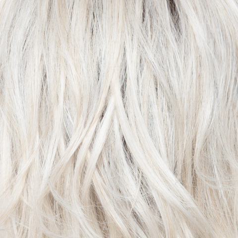 White Rose Blond-R - A white blond base with subtle warm brown highlights. The medium-brown root creates a vibrant appearance.