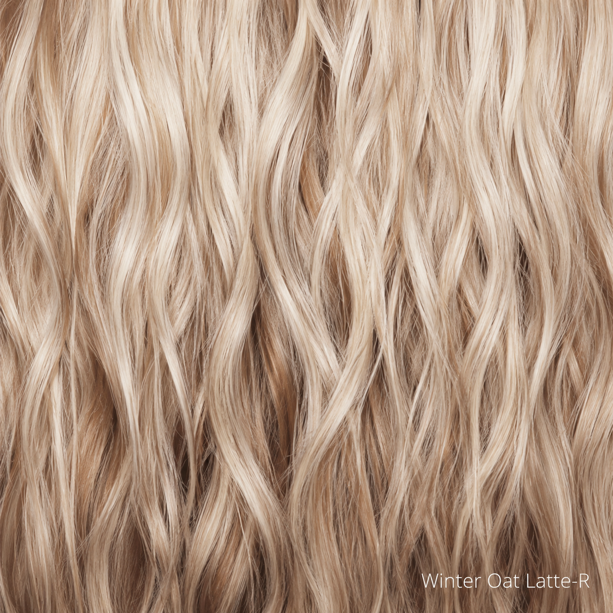 A rooted honey blonde and platinum blonde blend with soft, dimensional highlights and lowlights. Lighter, sun-kissed face-framing pieces and ends give this shade a natural, multi-tonal finish.