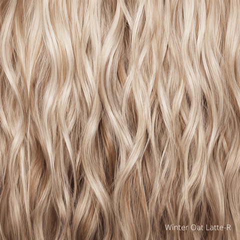 A rooted honey blonde and platinum blonde blend with soft, dimensional highlights and lowlights. Lighter, sun-kissed face-framing pieces and ends give this shade a natural, multi-tonal finish.